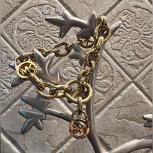 Michal Kors gold lock toggle bracelet